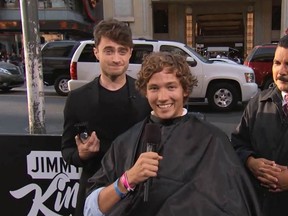 Daniel Radcliffe with a stranger about to get his hair cut. 

(YouTube/JimmyKimmel)