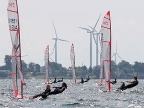 Competitors tack into the wind during a qualifying race at the 29er World Sailing Championship in Kingston on Wednesday afternoon. (ELLIOT FERGUSON/The Whig-Standard)