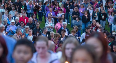 Over a thousand people stand in silence at a candle lit vigil for six-year-old Addison Hall in Greenway Park in London on Wednesday July 30, 2014.  Addison Hall was killed last Friday while walking in a south London Costco store with her mother when the family was struck by a car.
CRAIG GLOVER The London Free Press / QMI AGENCY