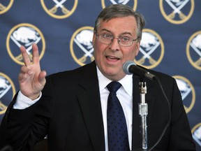 Buffalo Sabres owner Terry Pegula gestures as he speaks during a news conference announcing the new ownership of the NHL hockey team in Buffalo, New York February 22, 2011. (REUTERS/Gary Wiepert)