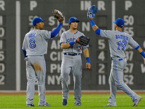 The Toronto Blue Jays celebrate sweeping the Boston Red Sox on Wednesday night in Boston. (USA TODAY SPORTS)