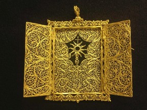 A high karat gold Pyx which was believed to have been handcrafted in the late 1600's - early 1700's for transporting a Eucharist (communion wafer) is seen in an undated handout photo from 1715 Fleet-Queen's Jewels. (REUTERS/1715 Fleet-Queen's Jewels, LLC/Handout)