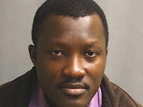 Bayol Avah, 27, has been arrested for allegedly posing as a special needs and education assistant at an assortment of Toronto elementary schools. (Toronto Police photo)