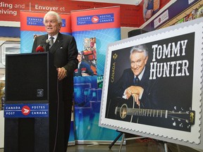 Legendary country musician Tommy Hunter has been honoured with stamp by Canada Post. He was attended the official unveiling at the Commissioners Road and Wellington Road post office in London on Thursday. DEREK RUTTAN/ The London Free Press /QMI AGENCY