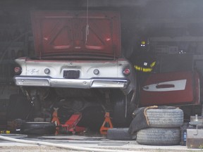 Vulcan resident Doug Miller's 1961 Plymouth Rage was badly damaged in a garage fire Thursday afternoon. Stephen Tipper Vulcan Advocate