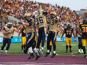 The Bombers have plenty to celebrate after Thursday's nail-biter victory over the Ticats. (MARK BLINCH/Reuters)