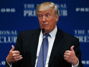 Real estate developer Donald Trump gives a luncheon speech at the National Press Club in Washington May 27, 2014. (REUTERS/Gary Cameron)