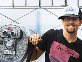 Singer Jason Mraz smiles on top of the Empire State Building as he announces "The Five Boroughs Tour" and celebrates the release of his latest album, "Yes", in New York July 16, 2014.  REUTERS/Lucas Jackson