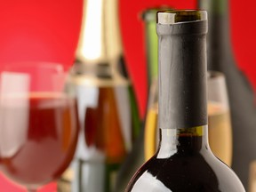 A glass of wine and a bottle.(Fotolia.com)
