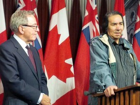 Former Treaty 3 Grand Chief Steve Fobister Sr. speaks next to Aboriginal Affairs Minister David Zimmer after demanding that changes be made to help those in Grassy Narrows affected by mercury poisoning.