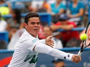 Milos Raonic hits a backhand against Steve Johnson at the Citi Open in Washington, D.C. on Friday, Aug. 1, 2014. (Geoff Burke/USA TODAY Sports)
