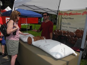 Shelley Vaters, of Woodstock, stopped by the feelmybamboopillow.com booth at London Ribfest Friday, Aug. 1, 2014. (JOE BELANGER, The London Free Press)