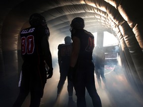 The Ottawa RedBlacks took on the Toronto Argonauts during their home opener at TD Place at Lansdowne Park in Ottawa Friday July 18,  2014. The RedBlacks before running out on to the field.  RedBlacks defeated the Argonauts 18-17. Tony Caldwell/Ottawa Sun/QMI Agency
