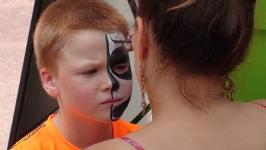 Saturday, Aug. 2, 2014 Ottawa -- Ryder, 7, from Stittsville was excited to show off his 'two-face' at Ottawa International Buskerfest on Sparks St. Saturday, Aug. 2, 2014.
 KELLY ROCHE/OTTAWA SUN/QMI AGENCY