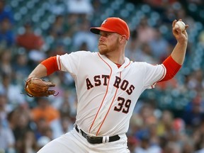 Brett Oberholtzer #39 of the Houston Astros throws a pitch during the third inning of their game with the Toronto Blue Jays at Minute Maid Park on August 2, 2014 in Houston, Texas.  

Scott Halleran/Getty Images/AFP