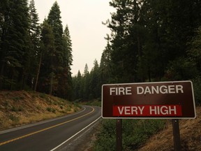 A fire danger rating sign is seen along the closed Highway 120 in Yosemite National Park in Big Oak Flat, California July 30, 2014.

REUTERS/Robert Galbraith