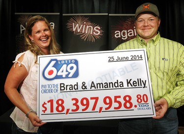 Lucky couple. Bradley Kelly and his wife Amanda Kelly speak to the media about their $18 million Lotto 6/49 win during a press conference, in St. Albert Alta., on Tuesday July 29, 2014. The Kelly's had the winning ticket for the June 25, 2014 draw. David Bloom/Edmonton Sun/ QMI Agency