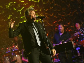 Jon Bon Jovi performs onstage at the Songwriters Hall of Fame 45th Annual Induction and Awards at Marriott Marquis Theater on June 12, 2014 in New York City. ( Larry Busacca/Getty Images for Songwriters Hall Of Fame/AFP)