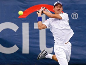 Kei Nishikori hits a backhand against Richard Gasquet (not pictured) on Day 5 of the Citi Open tennis tournament at the Fitzgerald Tennis Center. Gasquet won 6-1, 6-4. (Geoff Burke-USA TODAY Sports)