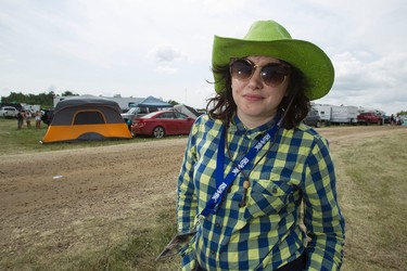 The Edmonton Sun's Catherine Griwkowsky is seen wearing her Western attire and mirrored sunglasses in the campground during Big Valley Jamboree 2014 in Camrose, Alta., on Sunday, Aug. 3, 2014. Ian Kucerak/Edmonton Sun/QMI Agency