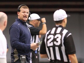 Winnipeg Blue Bombers head coach Mike O'Shea reacts during the first half of CFL game against the B.C. Lions.