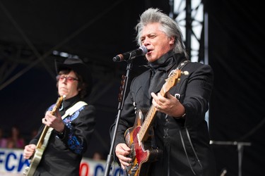 Marty Stuart (right) and band member Kenny Vaughan perform on the main stage during Big Valley Jamboree 2014 in Camrose, Alta., on Sunday, Aug. 3, 2014. Ian Kucerak/Edmonton Sun/QMI Agency