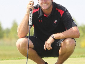 Taylor Pendrith lines up a putt during a practice round for the Canadian Amateur golf in Winnipeg, Man. Sunday August 03, 2014.