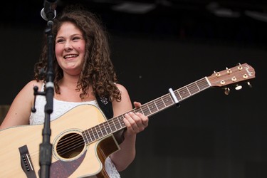 Sydney Mae, 13, performs on the main stage during Big Valley Jamboree 2014 in Camrose, Alta., on Sunday, Aug. 3, 2014. Mae won a contest for the right to sing a song on the main stage. Ian Kucerak/Edmonton Sun/QMI Agency