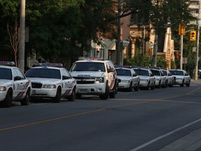 Police responde after a man was wounded in the Sherbourne St.-Dundas St. E. area. (JACK BOLAND, Toronto Sun)
