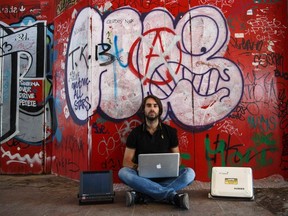 Cybersecurity researcher Ruben Santamarta poses for a photo in Coslada, near Madrid, July 30, 2014.  REUTERS/Andrea Comas