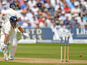 India captain Mahendra Singh Dhoni is run out by England’s James Anderson during their match last month in Nottingham, England. (REUTERS)