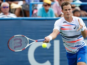 Vasek Pospisil hits a forehand against Milos Raonic in the men's singles final at the Citi Open tennis tournament in Washington, D.C. on Aug. 3, 2014. (Geoff Burke/USA TODAY Sports)