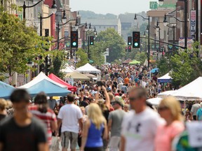 Princess Street is jammed packed with people of all ages out to enjoy the sun, music and sales for the fourth annual Princess Street Promenade on Saturday. The street was closed to traffic from Division Street to Ontario for the most of the day while downtown businesses and community groups offered sales, activities and promoted healthy living to residents and tourists.  (Julia McKay/The Whig-Standard)