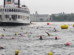 Competitors in the long-course triathlon prepare to enter the water Sunday morning for the 31st edition of the K-Town Tri. (Julia McKay/The Whig-Standard)