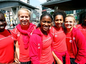 Members of Canada’s U-20 women’s World Cup soccer team at Yonge-Dundas Square last month, from left: Sura Yekka, Rebecca Quinn, Nichelle Prince, Amandine Pierre-Louis and captain Kinley McNicoll. The team plays its first game against Ghana at BMO Field on Tuesday. (Stan Behal/Toronto Sun)