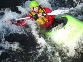 Jim Moodie/The Sudbury Star
Peter Andersen of Sudbury braces while navigating a rapid in the Wanapitei River on Sunday.