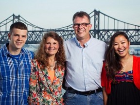 This undated picture, provided to AFP by Simeon Garratt, Canadian Christian activists Kevin Garratt and Julia Dawn Garratt's son, shows (L-R)  Simeon's brother Peter, Julia Dawn Garratt, Kevin Garratt, and Simeon's sister Hannah, posing for a family photo.  China is investigating the two Canadian Christian activists for alleged espionage, state media and their son said, a week after Ottawa accused Beijing of cyber-spying. Kevin Garratt and Julia Dawn Garratt "are under investigation for suspected theft of state secrets about China's military and national defence research," the state-run news agency reported. (AFP PHOTO / SIMEON)