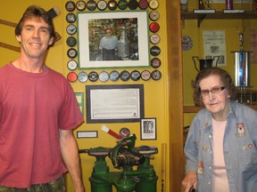 Pictured with the new Frank Dymock display at the Wallaceburg & District Museum are Frank’s wife Jo-Ann and his son Dan Dymock.
The Dymock family who donated memorabilia from his collection. Along with sharpening skates for free for decades, Frank Dymock was also a huge collector of local hockey memorabilia, specifically pucks. The display is in the Wallaceburg Sports Hall of Fame room at the museum. The museum is open Monday thru Saturday from 10 a.m. to 4 p.m.