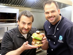 Chris Nannarone, host of Best in Chow, and Paul Shufelt with Delux's classic burger.