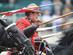 A member of the Musical Ride lets out a yell during the highlight of the show. CHARGE!  Stuart Dryden photo/QMI Agency.