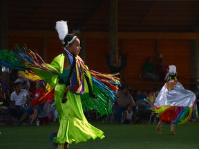 A girl takes part in one of the dance categories at the powwow in Crowlodge Park during Piikani Nation's 57th annual celebrations that were held over the long weekend. Highlights of the expansive celebrations included the Ironman and Ironwoman fancy dance world championships and the relay races at the rodeo. John Stoesser photos/QMI Agency.