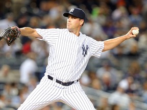 New York Yankees relief pitcher Matt Thornton (48) pitches against the Boston Red Sox during the ninth inning of a game at Yankee Stadium. Mandatory Credit: Brad Penner-USA TODAY Sports