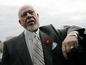 Canadian hockey commentator Don Cherry speaks to journalists on Parliament Hill in Ottawa November 7, 2006. (QMI Agency)