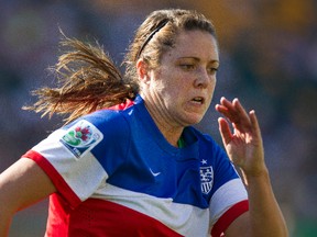 USA Stephanie Amack (16) runs for a ball against Germany during FIFA U-20 World Cup play at Commonwealth Stadium in Edmonton Alta., on Aug. 5, 2014. Ian Kucerak/Edmonton Sun/ QMI Agency