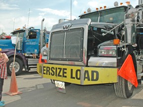 Ryland Fee was one of dozens of Mitchell and area children enjoying all the big trucks and vehicles during the 4th annual Big Trucks, Little Drivers family event put on by Perth Care For Kids on Saturday, July 26 at the Mitchell & District Arena. KRISTINE JEAN/MITCHELL ADVOCATE