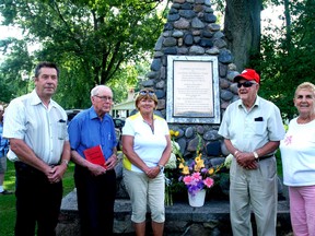 The Old Boys Association at the Port Glasgow Trailer Park last week dedicated the cairn and its plaque to the founders of the park and the pioneers and veterans of the First and Second World Wars on the anniversary of the start of the First World War. At the dedication were left, West Elgin Coun. Richard Leatham. Keith Kelly, one of the original Old Boys, Shari Faryniuk of the Old Boys Association, Gord McFadden, also an Old Boy and Pauline Durocher of the Old Boys Association.