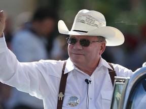 Canadian actor, William Shatner, best known for his character Captain James T. Kirk in Star Trek, takes part in the Stampede parade in Calgary, Alta. on July 4, 2014. (Al Charest/QMI Agency)