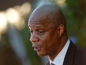 Darryl Strawberry speaks to the media about Gary Carter at the Gary Carter Memorial Tribute in Palm Beach Gardens, Florida February 24, 2012. (REUTERS/Andrew Innerarity)