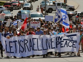 About 200 people participated in a demonstration and march to support Israel. Reuters photo