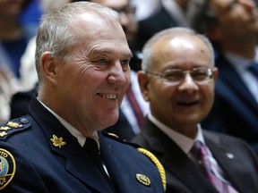 Toronto Police Chief Bill Blair and Police Board Services chair Alok Mukherjee. (Craig Robertson/Toronto Sun)